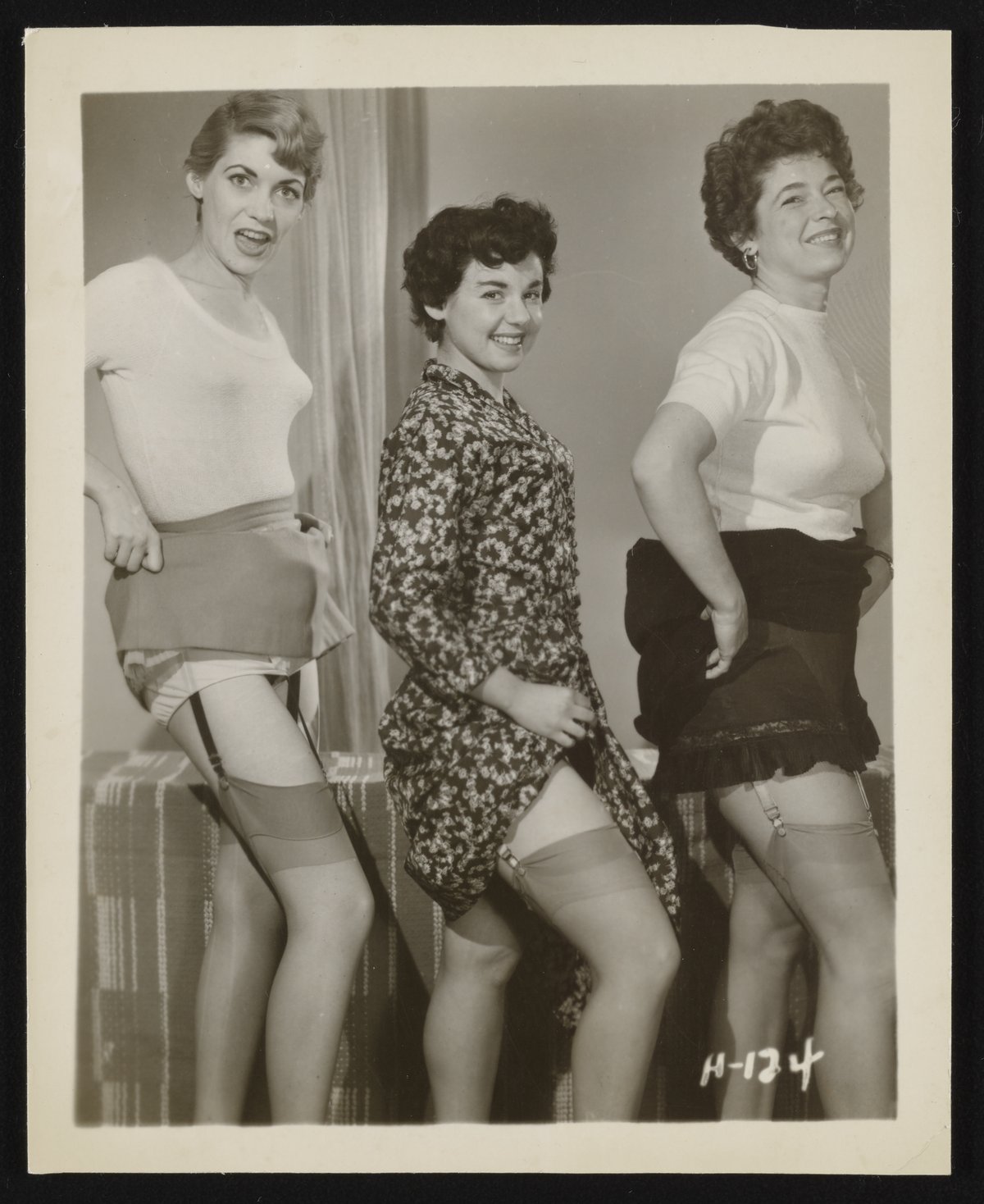 Trio of women modeling Nylon stockings - Science History Institute Digital  Collections